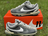 Authentic Sacai x Nike Cortez Grey/White