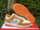 Authentic Nike Dunk Low Safari Swoosh “Kumquat”